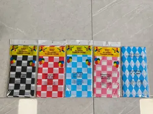 Detailed view of colorful checkered disposable plastic party tablecloths in packaging