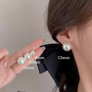 Detail view of elegant white pearl earrings showing 8mm, 10mm, and 12mm size options.