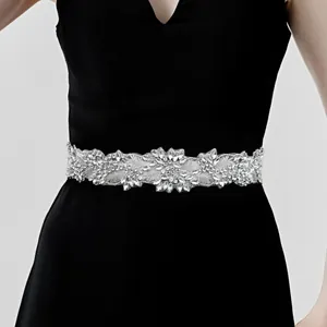 Sparkling crystal bridal belt with intricate floral rhinestone design for wedding dress