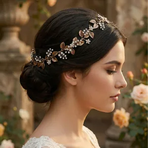 Elegant vintage handmade floral bridal hair vine featuring bronze leaves and pearls