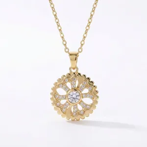 Close-up of gold snowflake pendant necklace with sparkling rotating zirconia stones