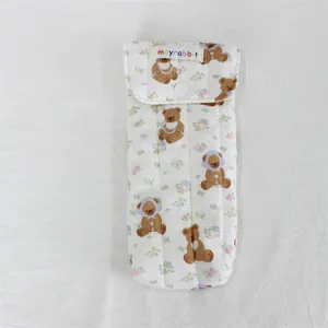 Cute brown teddy bear and floral pattern white quilted pouch with snap button closure