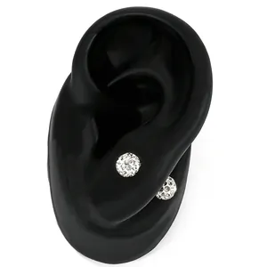 Detailed view of sparkling white crystal ball stud earrings with secure screw back