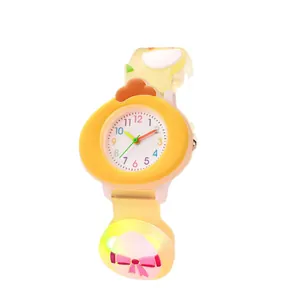 Cute yellow cartoon chicken glowing watch for children with colorful dial and pink bow