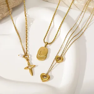 Detailed view of French retro stainless steel necklaces with star and moon charms