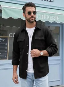 Detail view of a men's black slim-fit casual jacket with double chest pockets