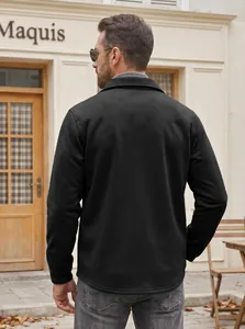 Detailed back view of a men's black slim fit lapel windproof casual jacket outdoors