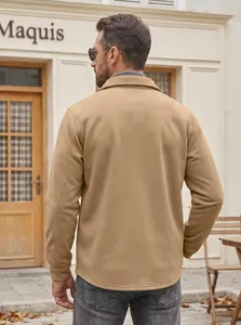 Back view of a khaki slim-fit windproof jacket for men in a stylish casual outdoor setting.