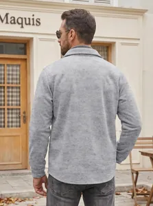 Back view of a grey textured casual slim fit jacket for men against a street background