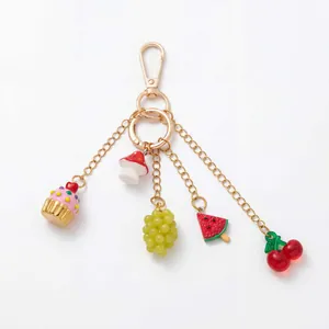 Kleurrijke tas hanger met cupcake druiven watermeloen en kersen details