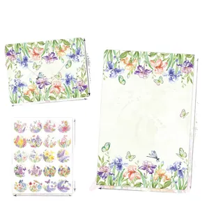 Watercolor floral stationery set with iris patterns, including letter paper and envelopes
