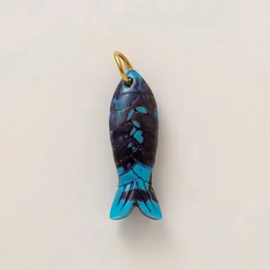 Detailed view of a marbled blue fish charm for ocean-themed DIY bag hanging accessory