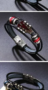 Macro view of vintage guitar head pendant and stainless steel clasp on leather bracelet
