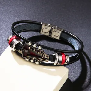 Vintage leather bracelet with guitar headstock charm and stainless steel clasp