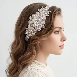 Macro view of luxury hand-sewn wide headband with sparkling AB rhinestones on a model
