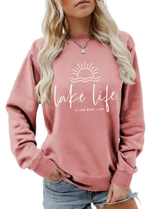 Detail view of pink Lake Life sweatshirt with soft texture and white graphic print