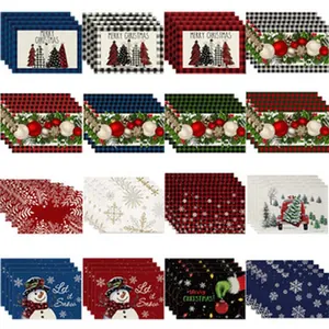 Set of festive Christmas linen placemats with trees and snowmen designs, 42x32cm