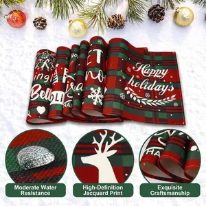 Close-up detail of red plaid Christmas placemat showing waterproof fabric and print