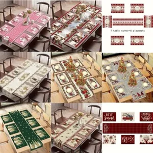 Detailed view of various festive Christmas cotton linen table runner and placemat sets
