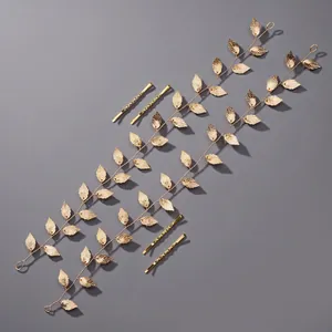 Elegant handmade gold leaf hair vine and hairpins set for bridal styling