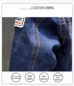 Close-up detail of high-quality denim jacket fabric featuring yellow contrast stitching.