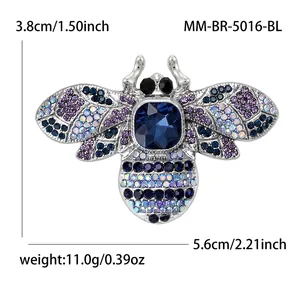 Vibrant bee brooch with blue rhinestones and dimensions, showing 5.6cm width detail