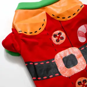 Close-up of dog Christmas T-shirt with festive gingerbread man design and glitter belt
