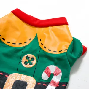 Close-up of festive dog Christmas T-shirt with glittery candy cane detail work