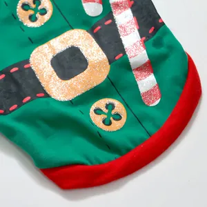 Close-up of green Christmas dog t-shirt featuring glitter candy cane and belt print.