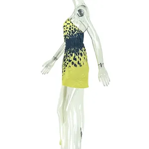 Detailed side view of a yellow and black leopard print one-shoulder mini bodycon dress