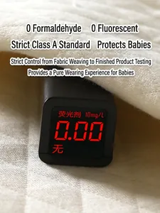 Test de sécurité du tissu du gilet chaud d'automne pour bébé sans fluorescence