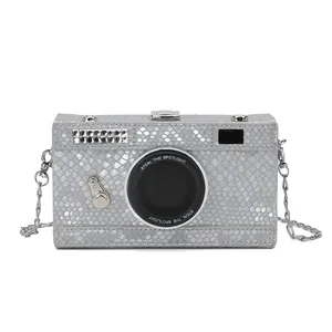 Vintage camera shaped crossbody bag with silver snakeskin texture and chain strap