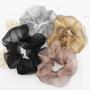 Elegant organza fabric hair scrunchies set in four neutral colors for versatile styling