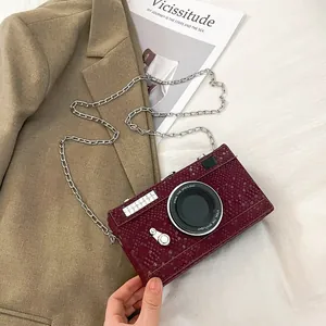 Vintage camera shaped hard box bag with burgundy snakeskin texture and silver chain strap