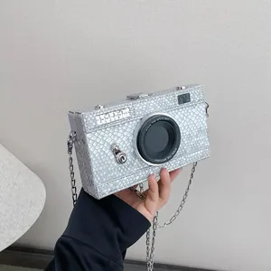 Retro camera-shaped silver hard box crossbody bag featuring a unique snakeskin texture
