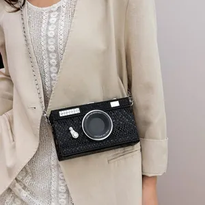 Vintage camera-shaped hard case crossbody bag with snake-skin texture and chain strap