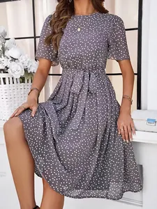 Elegant grey polka dot midi dress with tie-waist and short sleeves for summer wear.