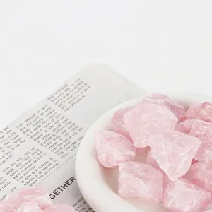 Detailed macro shot of natural pink rose quartz crystal aromatherapy diffuser stones