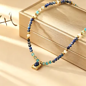 Close-up of a mixed natural stone beaded necklace with a Lapis Lazuli pendant