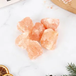 Detailed close-up showing the natural texture of pink Himalayan salt rocks for aromatherapy