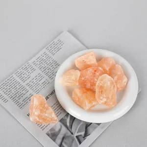 Macro view of natural orange calcite raw stones for home decor and aromatherapy.