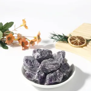 High-quality close-up macro view of deep purple natural amethyst raw crystal stones texture