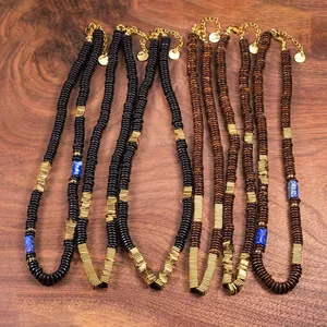 Detailed view of natural coconut shell beaded necklaces with copper alloy accents