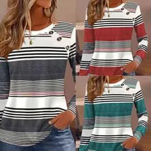 Detail view of women's long sleeve striped tops with shoulder button accents in three colors.