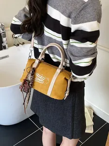 Vintage yellow Boston bag for women, versatile shoulder crossbody bag with bear charm