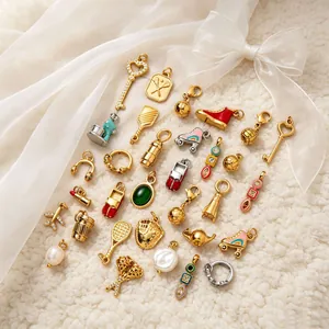 Detailed group view of 18K gold plated DIY charms in various creative shapes.