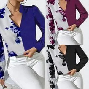 Detailed view of women's floral color-block long-sleeve blouses with unique wave V-neck