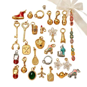 Selection of 18K gold plated DIY pendants featuring keys, flowers, and sports themes