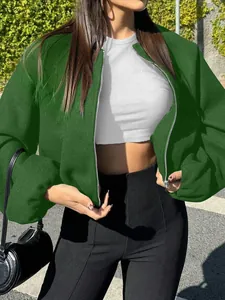 Close-up of a stylish dark green soft bomber jacket for women's autumn fashion