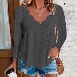 Elegant dark grey long sleeve blouse with scalloped neckline and eyelet jacquard detail.